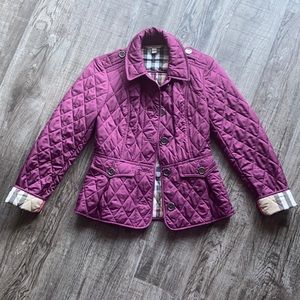 In love with this Burberry Rain coat Burgundy! Is a small size.